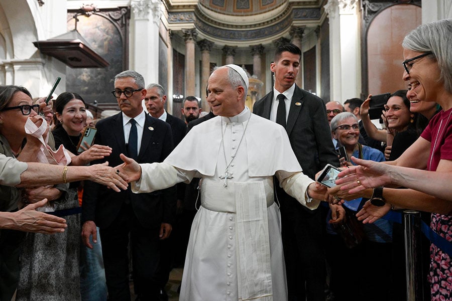 Pope Leo XIV greets the crowd during a meeting with members of diocesan charitable and assistance organizations at the Church of St. Augustine in Barcelona on June 10, 2026. | Credit: Vatican Media